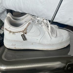 Nike AirForce 1s with gold charms